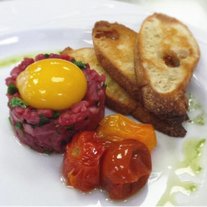 Tomato confit served with an appetizer